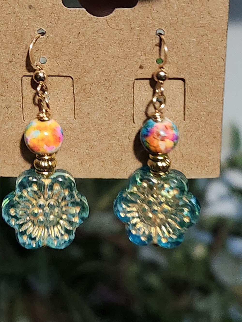 Dancing Gold-Accented Blue Floral Dangle Earrings with Multicolor Bead